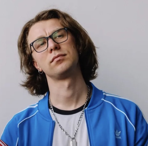 Sasha — bass player of 5051, blue Adidas jacket